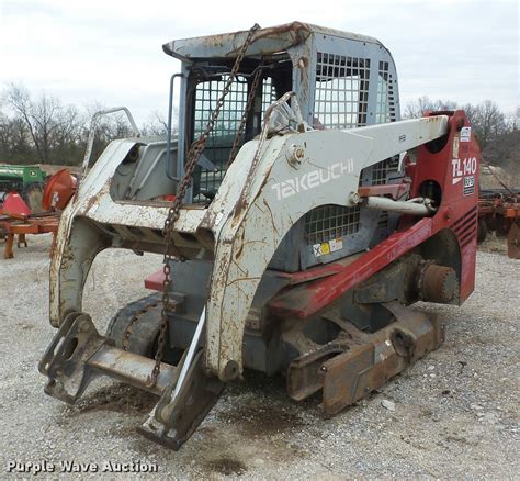 takeuchi tl140 oil capacity